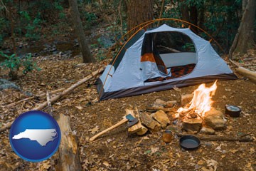 camping tent at a wilderness campsite - with North Carolina icon