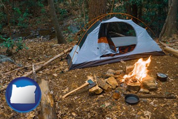 camping tent at a wilderness campsite - with Oregon icon