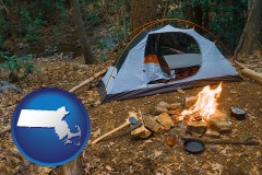 massachusetts map icon and camping tent at a wilderness campsite