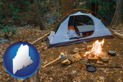 maine map icon and camping tent at a wilderness campsite