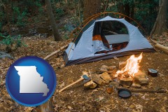 missouri map icon and camping tent at a wilderness campsite