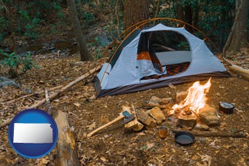 camping tent at a wilderness campsite - with Kansas icon